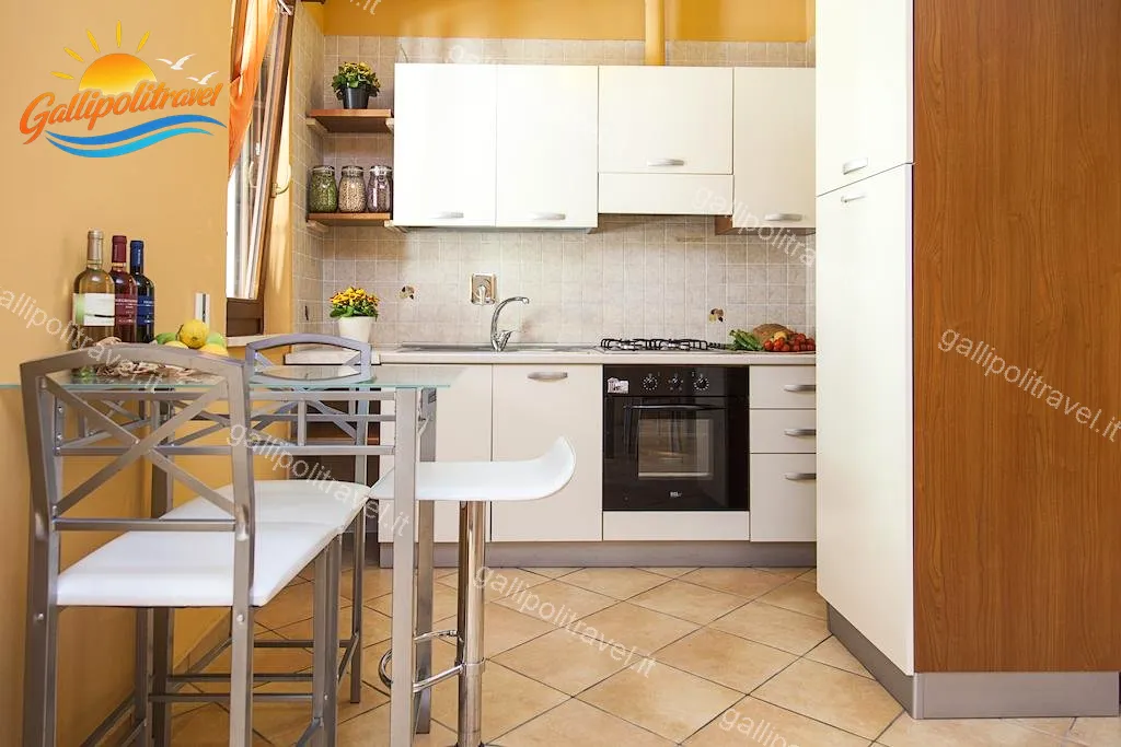 Cucina con piano bar Trilocale F1/1